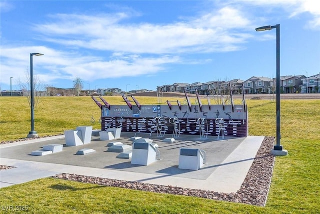 surrounding community featuring a residential view and a lawn