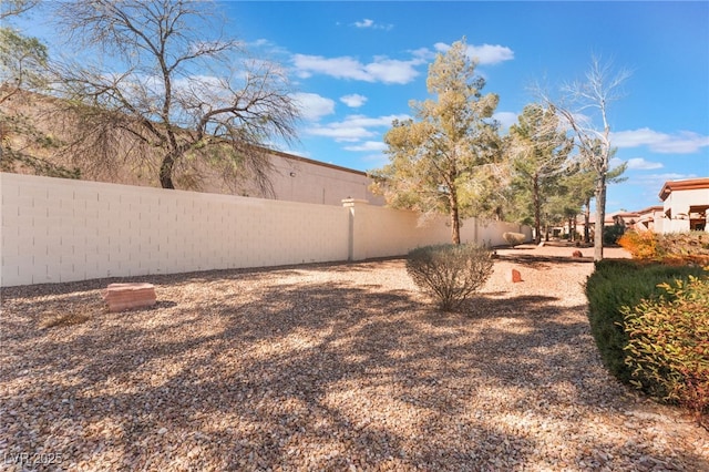 view of yard featuring a fenced backyard