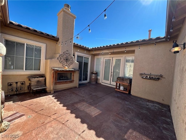 view of patio / terrace featuring french doors