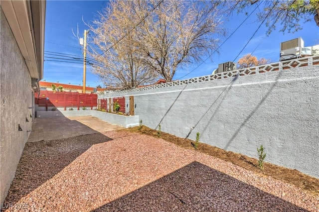 view of yard with a patio area and fence