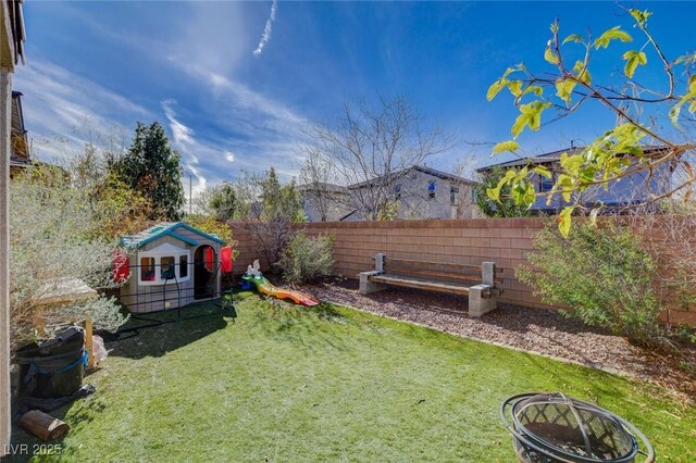 view of yard featuring a fenced backyard