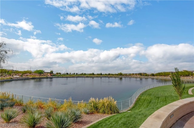 view of water feature with fence