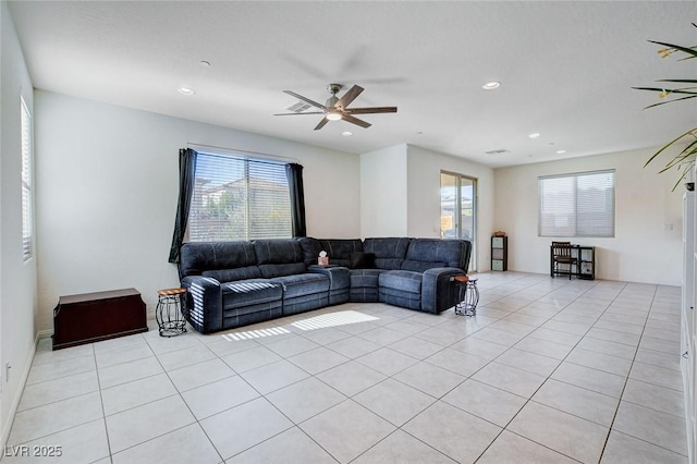 living room with ceiling fan, light tile patterned floors, and recessed lighting