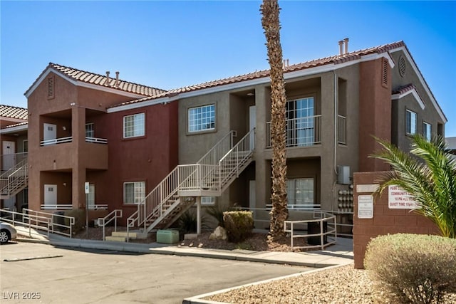 view of property with stairway