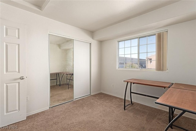 home office featuring carpet floors and baseboards