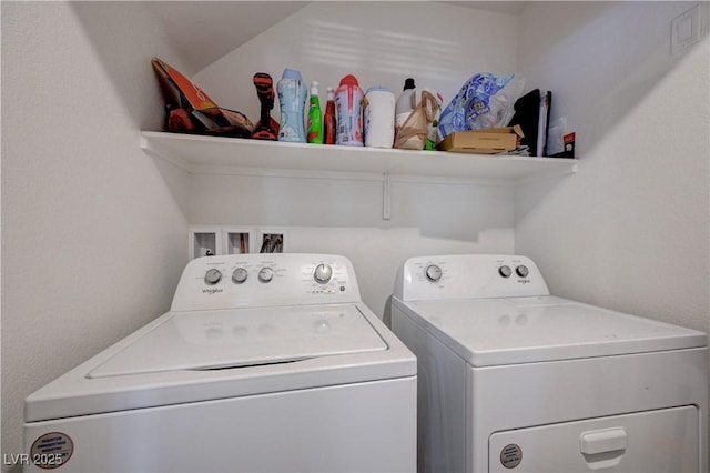 laundry area with separate washer and dryer