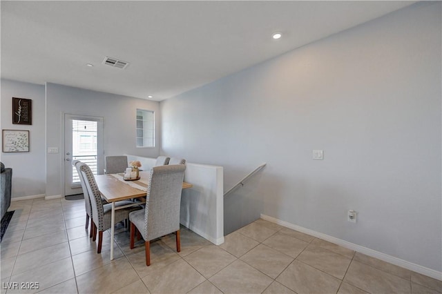 dining room with light tile patterned floors, recessed lighting, visible vents, and baseboards