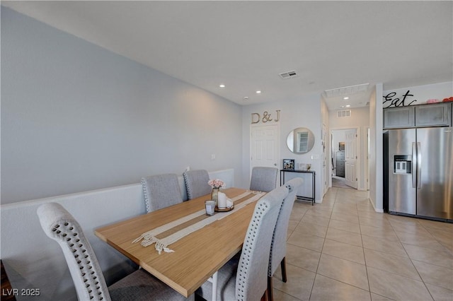 dining room featuring light tile patterned floors, visible vents, and recessed lighting