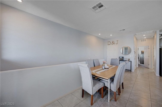 dining room with light tile patterned floors, visible vents, and recessed lighting