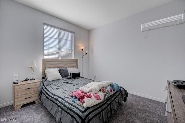 bedroom featuring carpet floors and baseboards