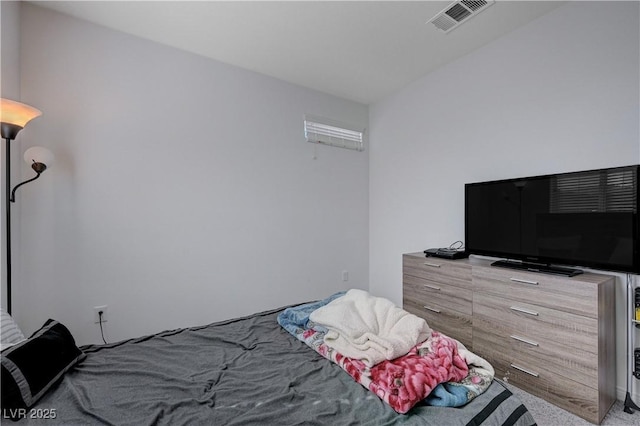 bedroom with carpet and visible vents