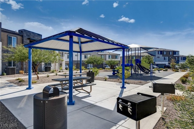 communal playground featuring a residential view and cooling unit