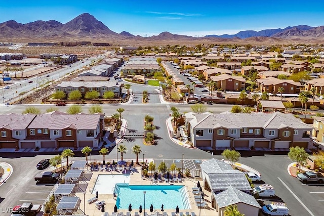 drone / aerial view with a residential view and a mountain view