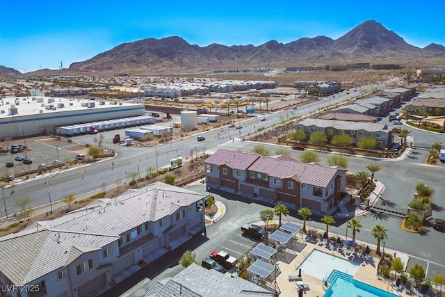 drone / aerial view with a residential view and a mountain view