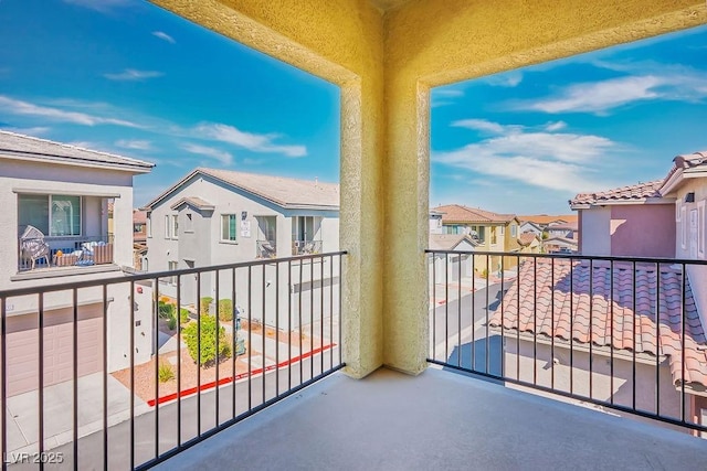 balcony featuring a residential view