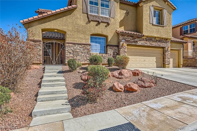 mediterranean / spanish house with a tiled roof, an attached garage, and stucco siding