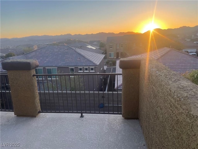 view of gate with a mountain view