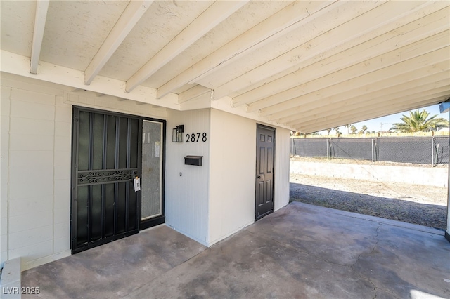 property entrance with fence