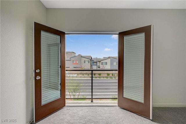 entryway with carpet floors