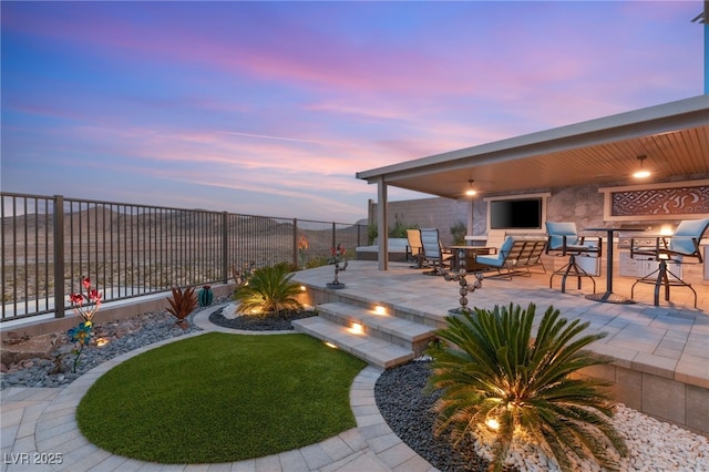 exterior space featuring a patio area and a fenced backyard