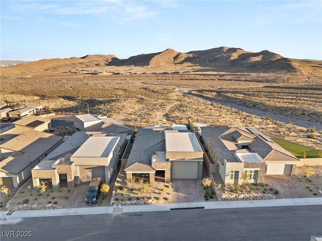 birds eye view of property with a residential view and a mountain view