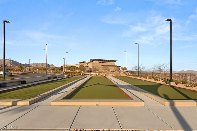 surrounding community featuring a mountain view