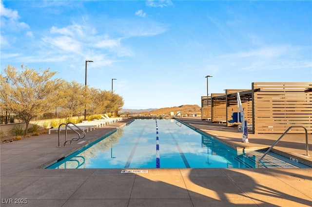 community pool with a patio