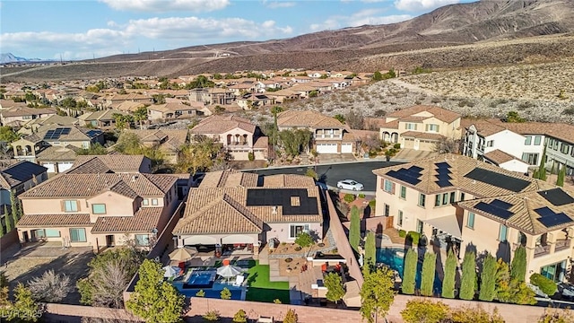 birds eye view of property featuring a residential view and a mountain view