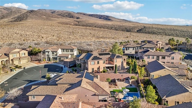 aerial view featuring a residential view and a mountain view