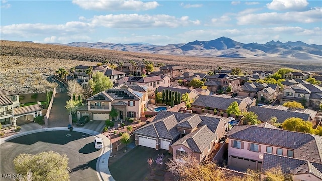 bird's eye view with a mountain view and a residential view