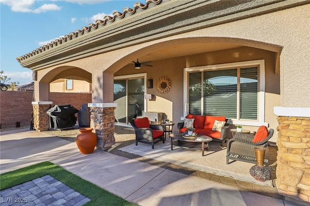 view of patio / terrace featuring a ceiling fan, an outdoor living space, fence, and grilling area