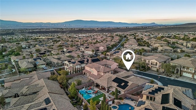 aerial view featuring a residential view and a mountain view