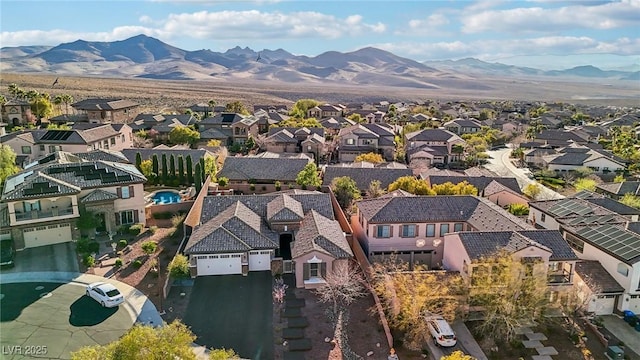 aerial view with a mountain view and a residential view