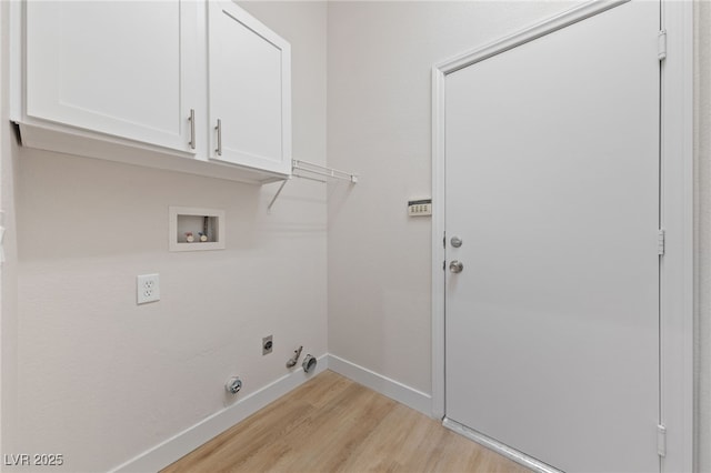 laundry area featuring light wood finished floors, cabinet space, baseboards, hookup for a washing machine, and electric dryer hookup