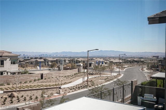 property view of mountains featuring a residential view