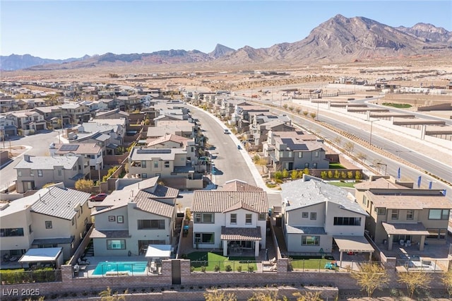 bird's eye view with a residential view and a mountain view