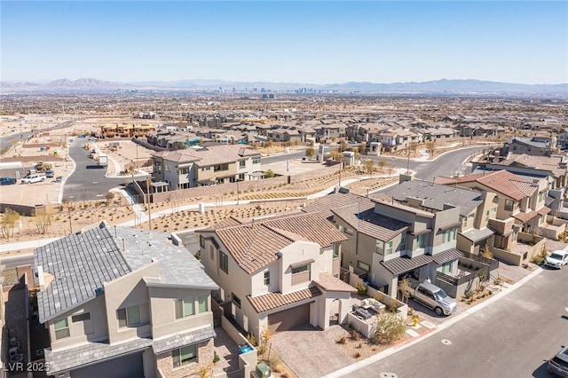 aerial view with a mountain view and a residential view