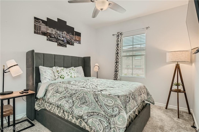 bedroom featuring carpet floors, a ceiling fan, and baseboards