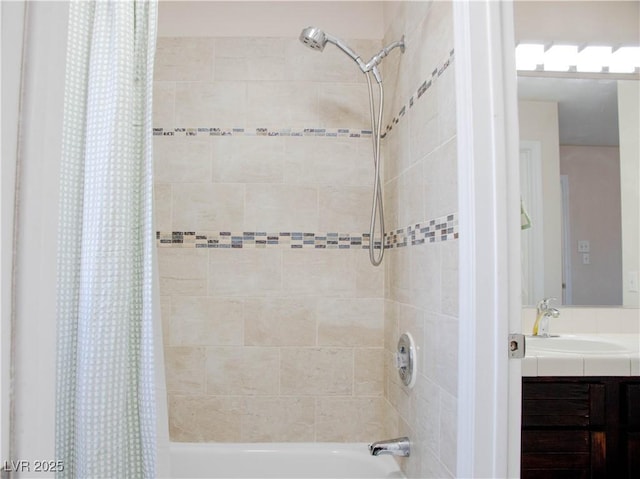 bathroom with shower / bath combination with curtain and vanity