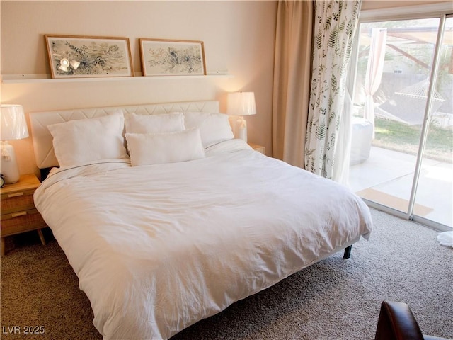 bedroom featuring access to exterior and carpet floors