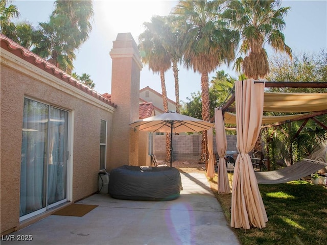 view of patio with fence