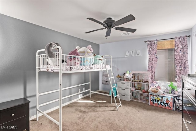 carpeted bedroom featuring visible vents and ceiling fan