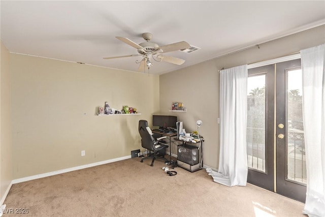 carpeted office with visible vents, french doors, baseboards, and ceiling fan