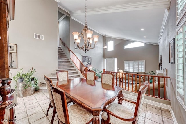 dining space with high vaulted ceiling, stairway, visible vents, and crown molding