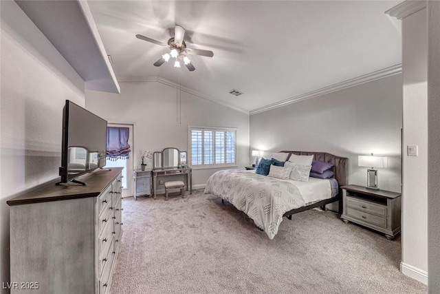 bedroom featuring lofted ceiling, light carpet, visible vents, and crown molding