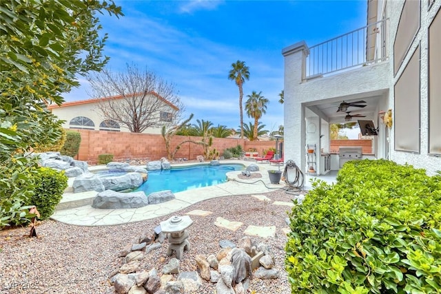 view of swimming pool with a fenced backyard, a patio, a fenced in pool, and area for grilling