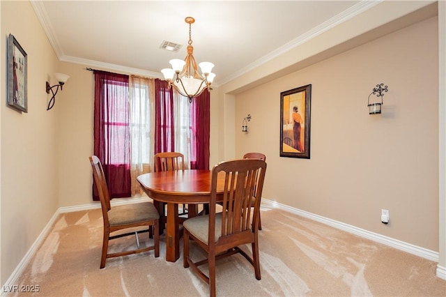 dining area featuring light carpet, ornamental molding, visible vents, and baseboards