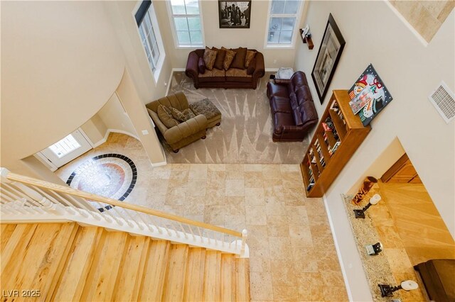 living area featuring visible vents