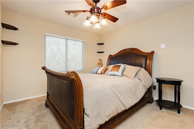 bedroom with light carpet, a ceiling fan, visible vents, and baseboards