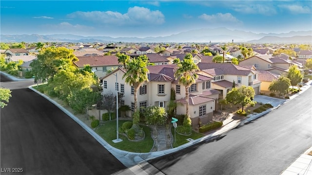 aerial view with a residential view and a mountain view